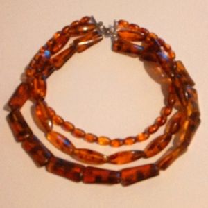 Vintage 3 Strand Amber Lucite Necklace. Good Shape